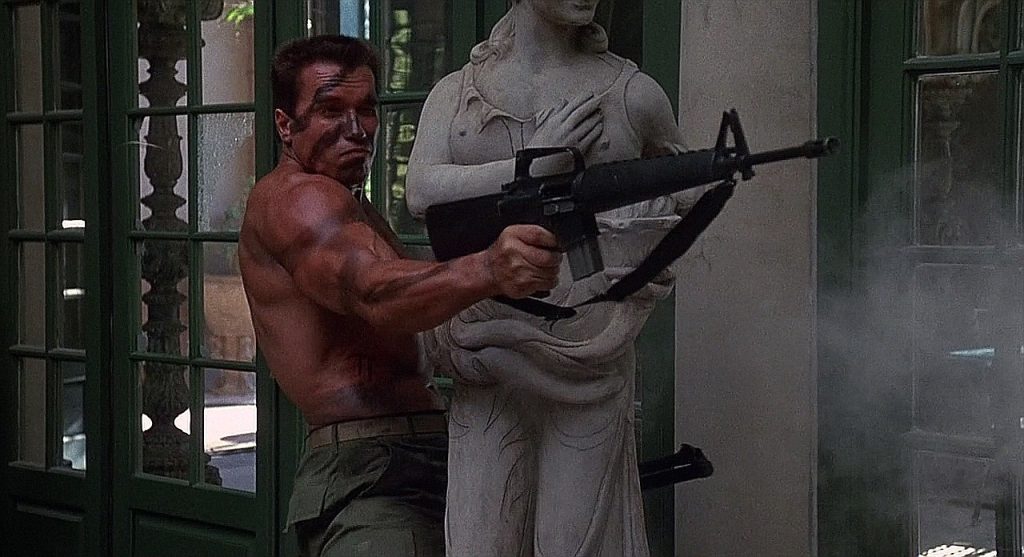arnold-schwarzennager-joh-matrix-commando-firing- M16A1-rifle