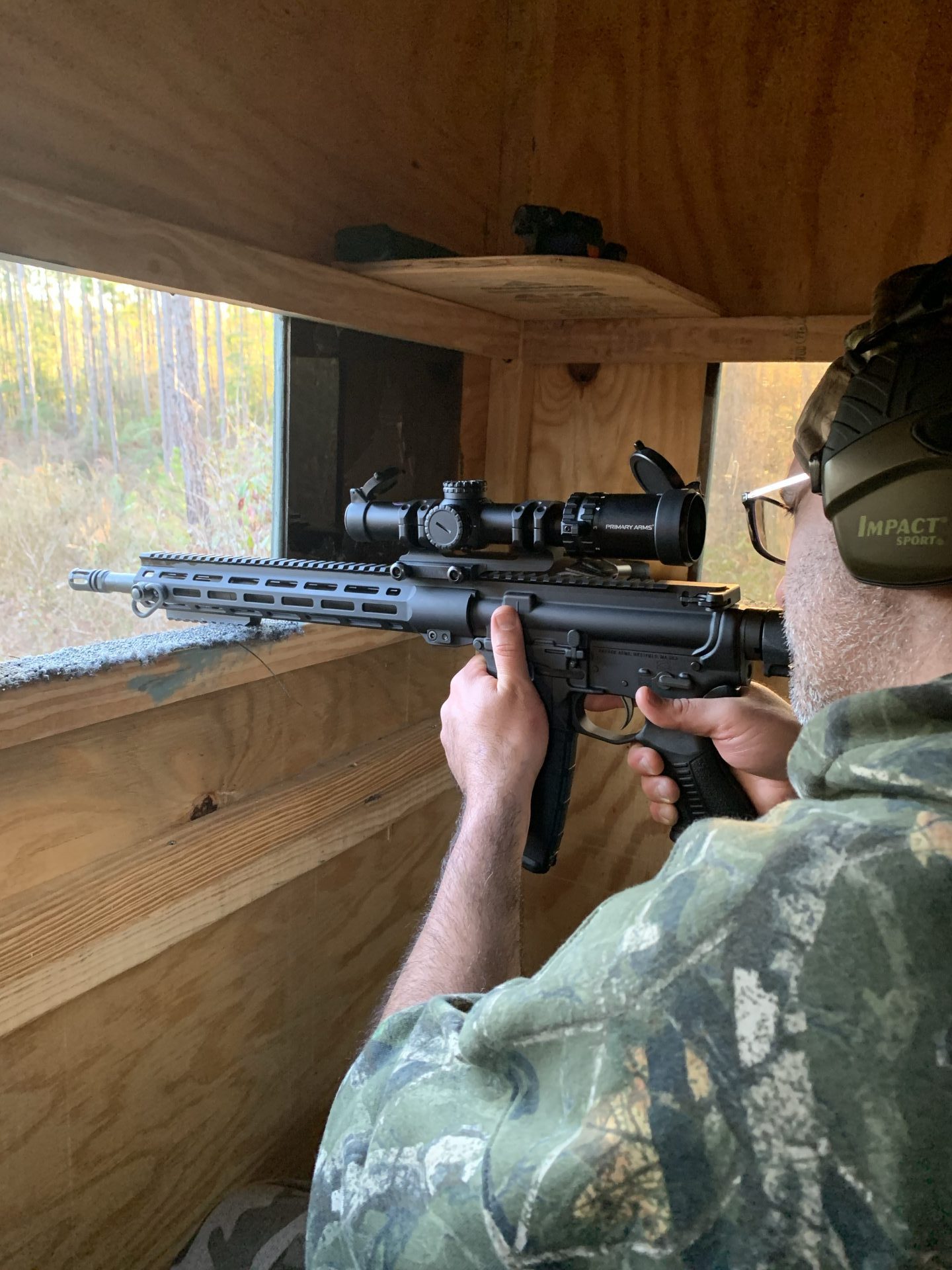 paris vega hunting deer with his rifle mounted with the primary arms SLX lpvo red dot scope